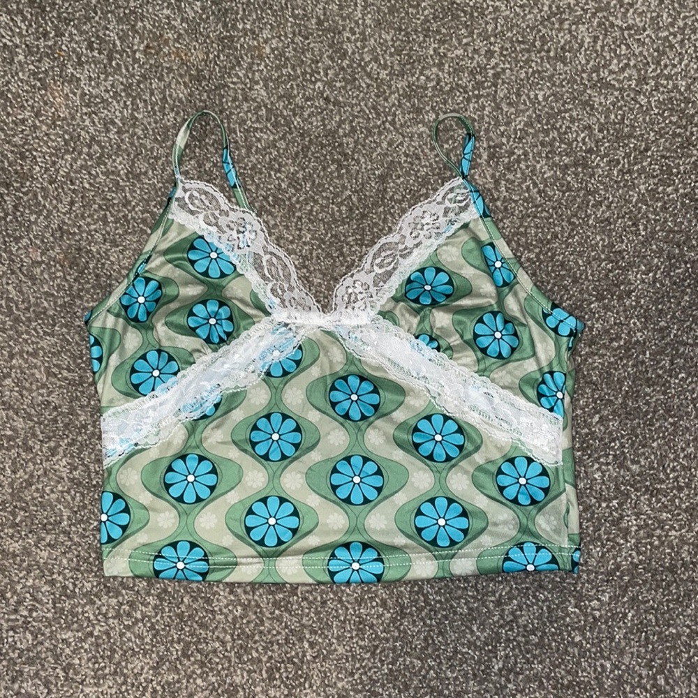 Green tank top with blue flowers and lace
